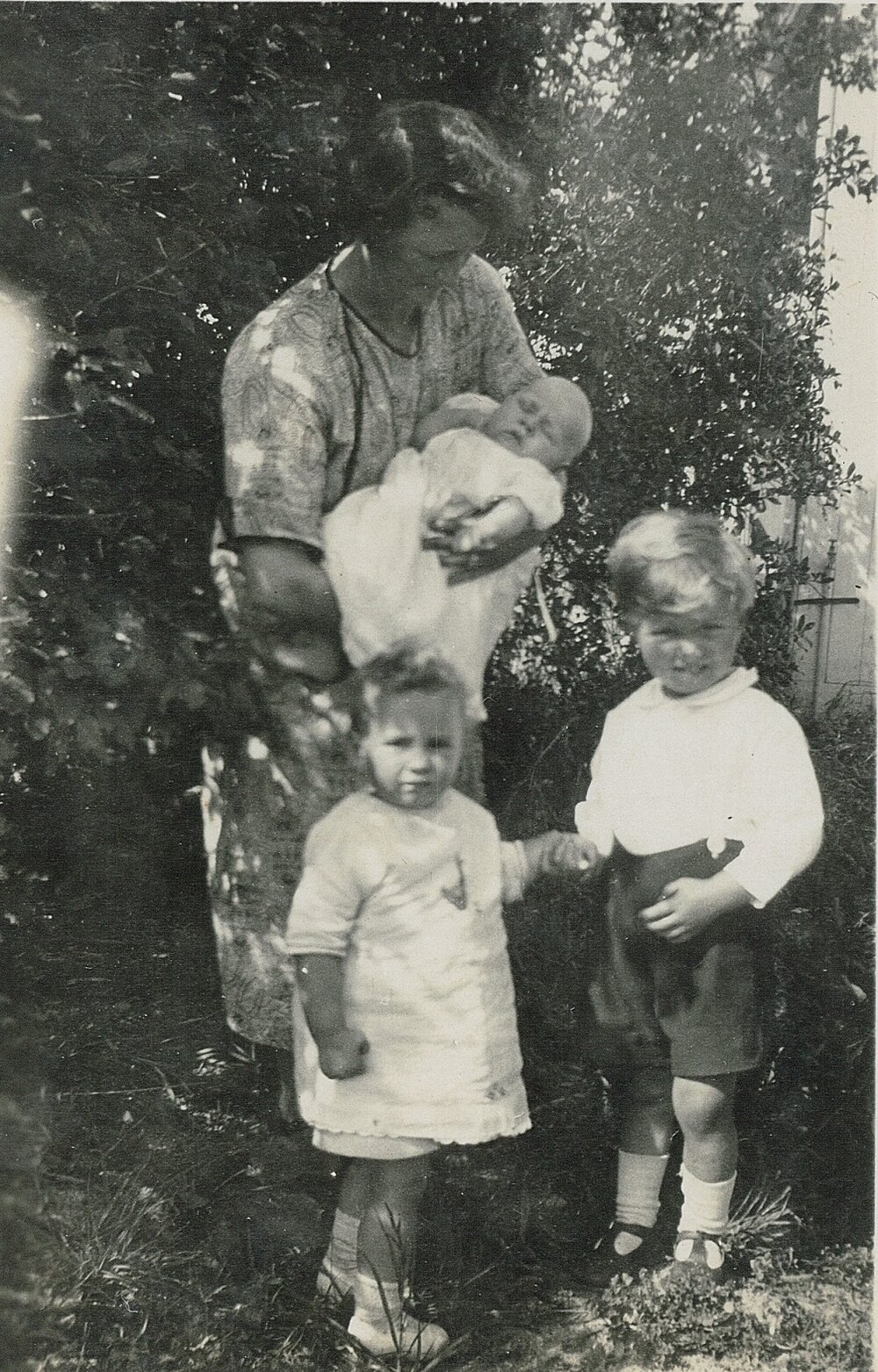 Three children and one adult, 1926