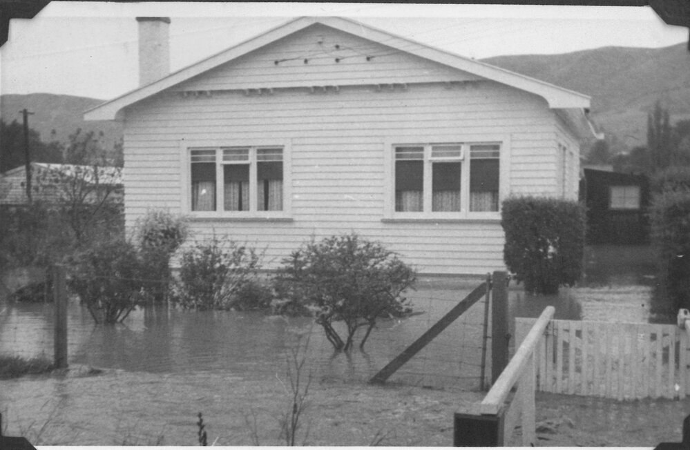Flooded front yard of house in Richmond