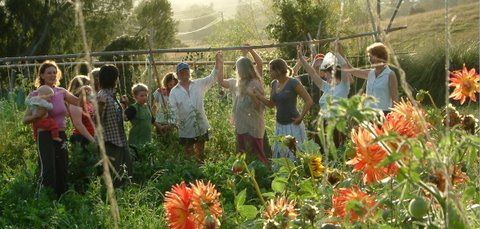 Happy in the garden at Riverside Community