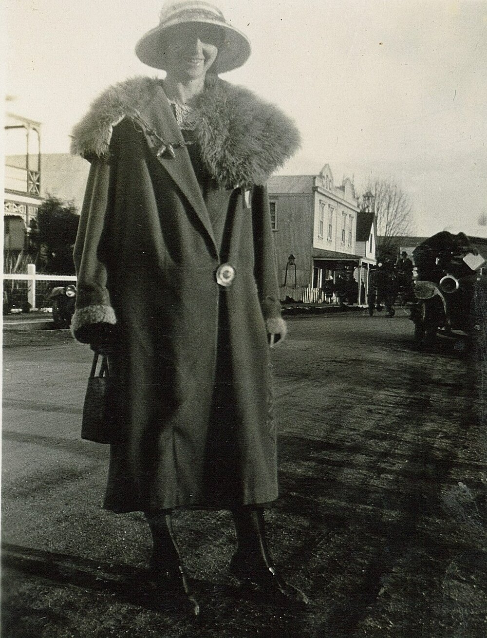Woman in fur collared coat 