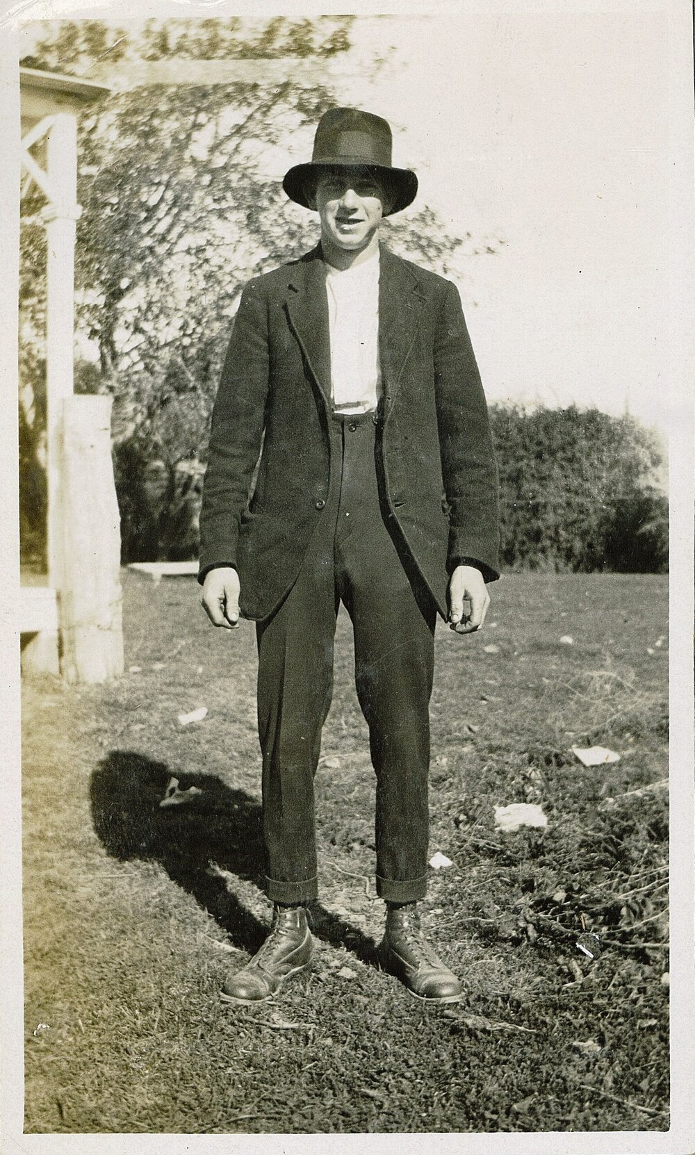Nelson with suit and hat