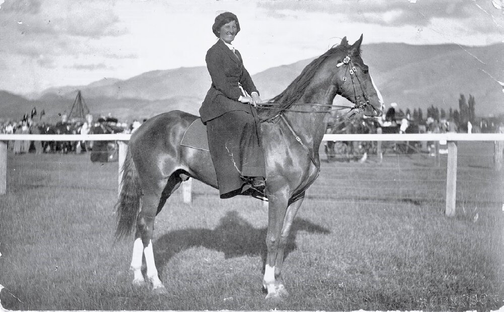Miss Stewart riding side saddle