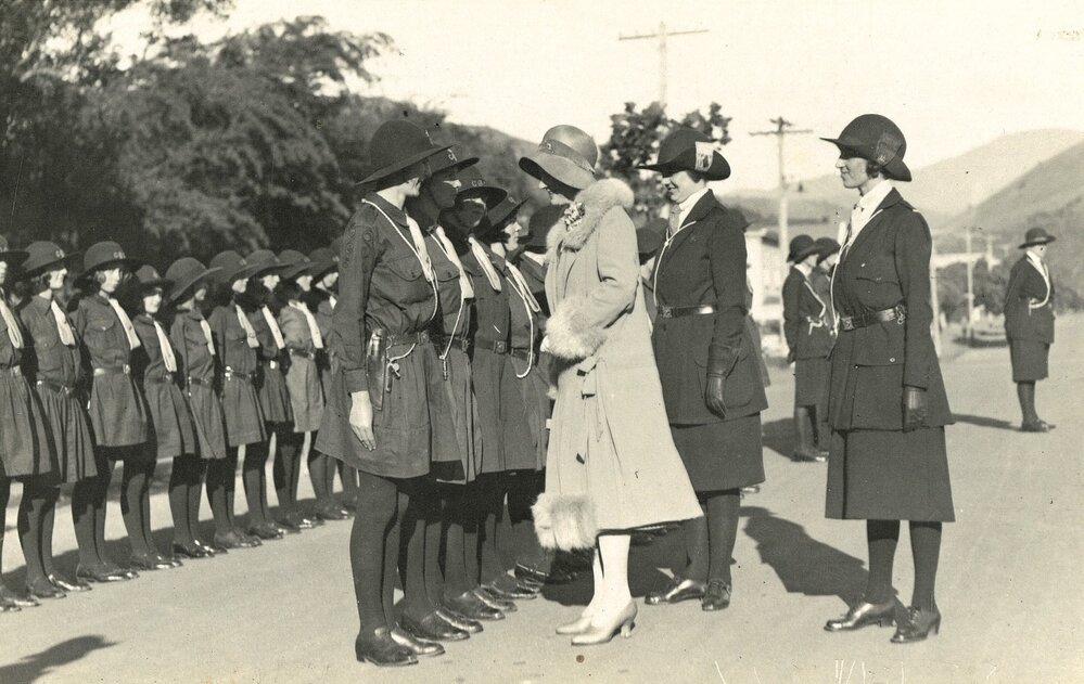 Dorothy Atmore inspecting the Girl Guides parade