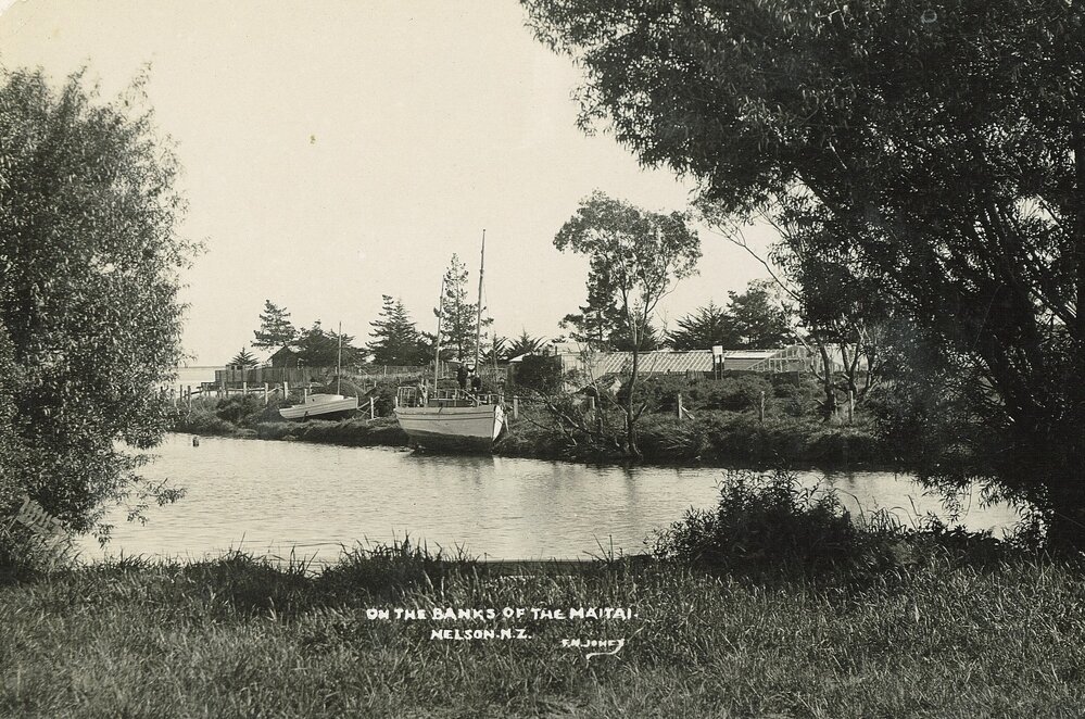 Boats on the banks of the Maitai River