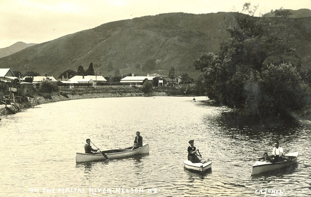 People in small boats on the Maitai River