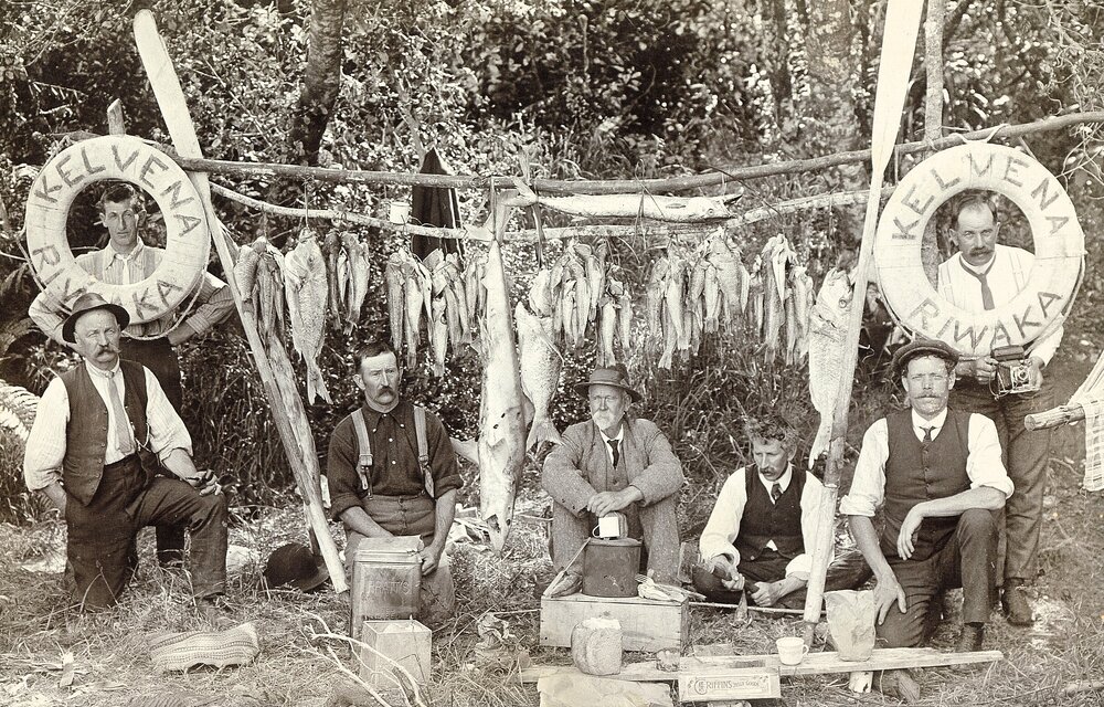 Men with fish and Kelvena life preservers