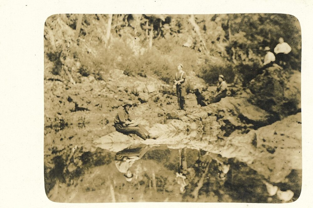 Group reflected in the water