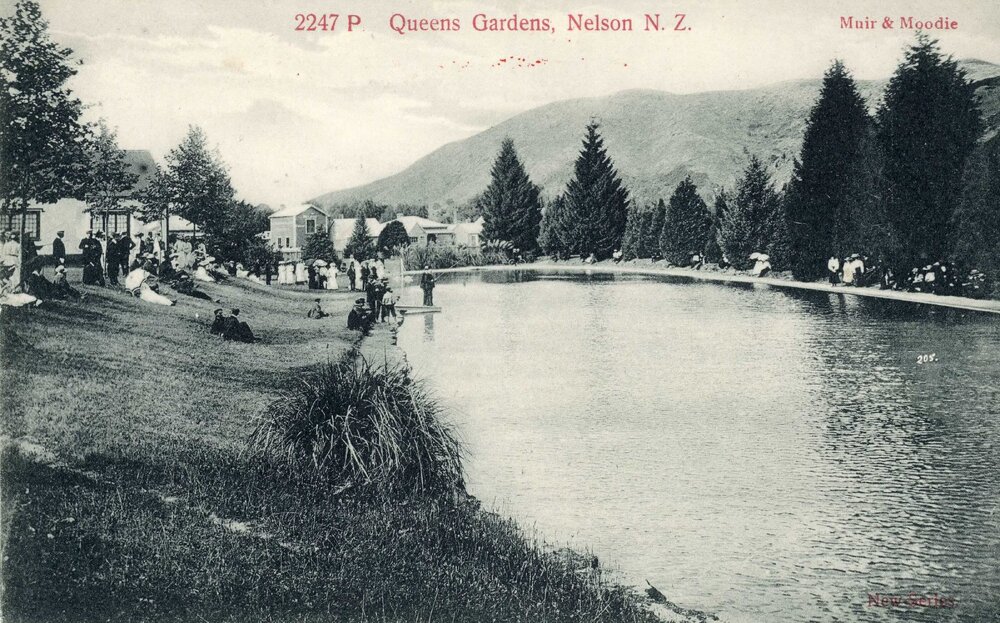 Crowd around the Queen's Gardens pond 