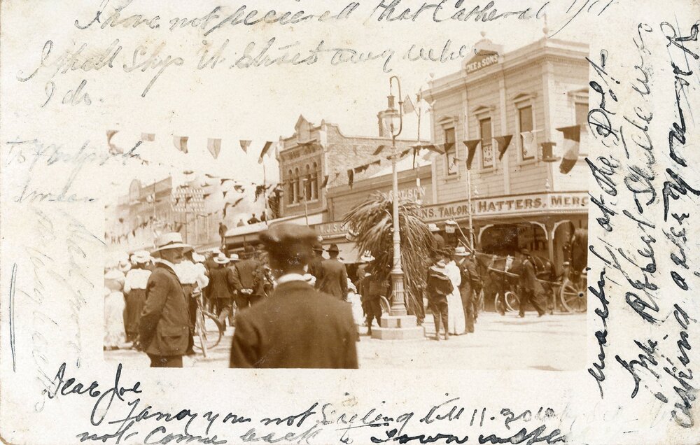 People outside Dee and Sons Ltd. in Trafalgar Street