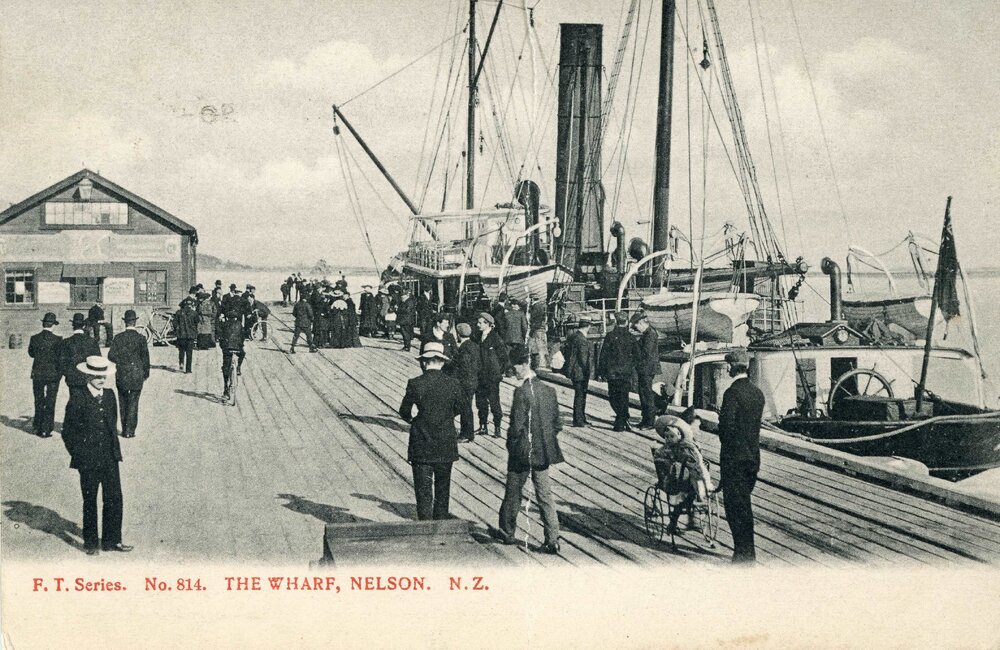 People gathered on the wharf in Nelson