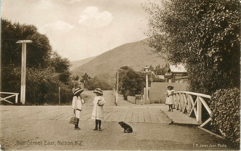 Children standing on Nile Street East