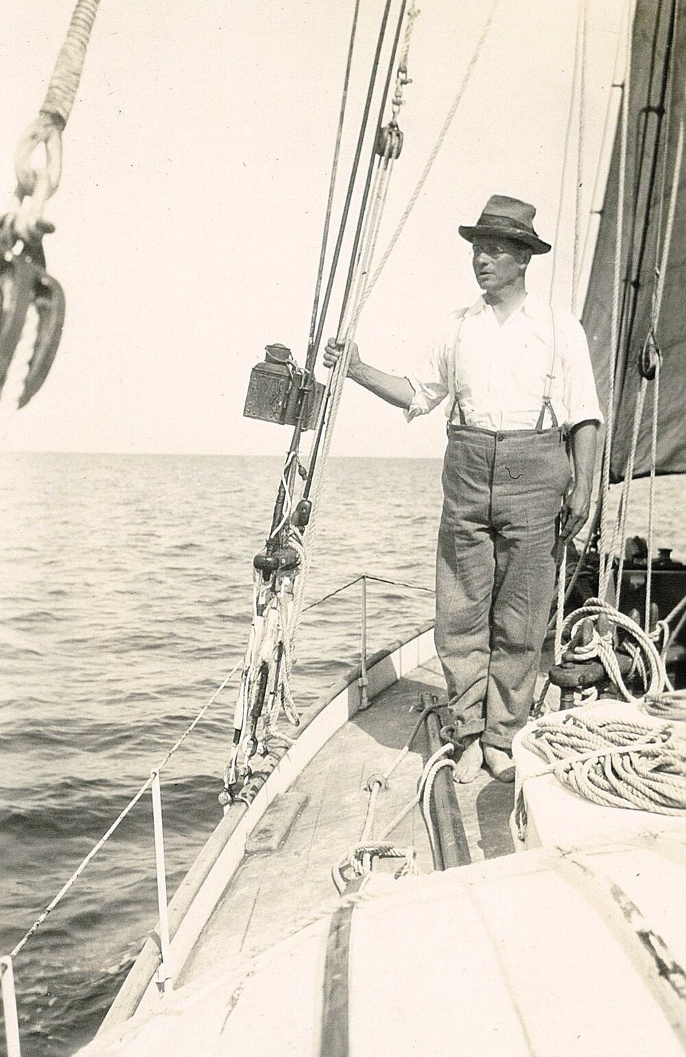 Man on deck of a yacht