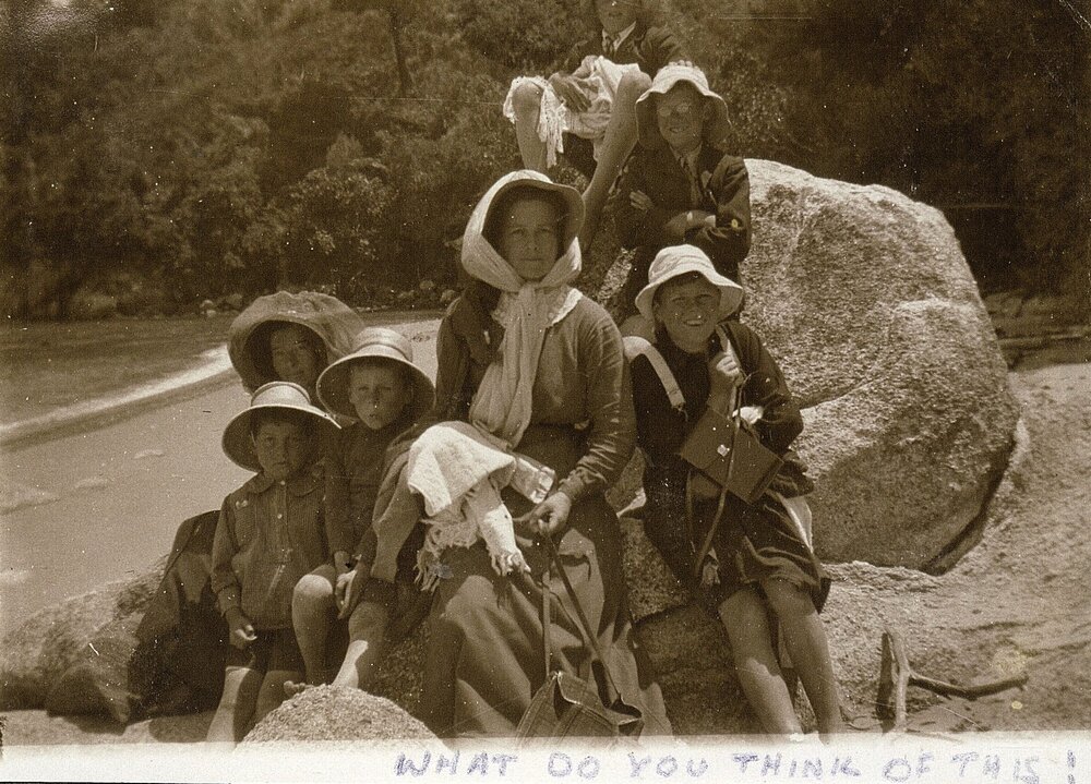 Glasgow family members on rock