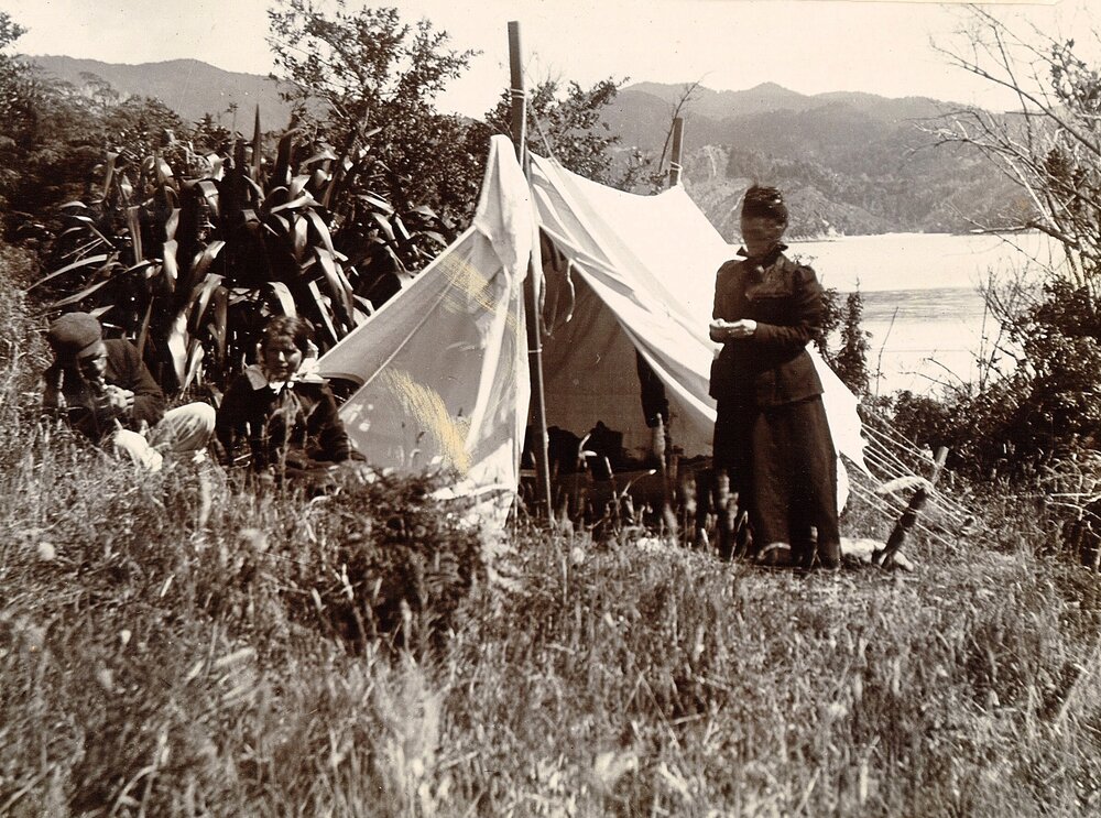 Family and tent at a campsite