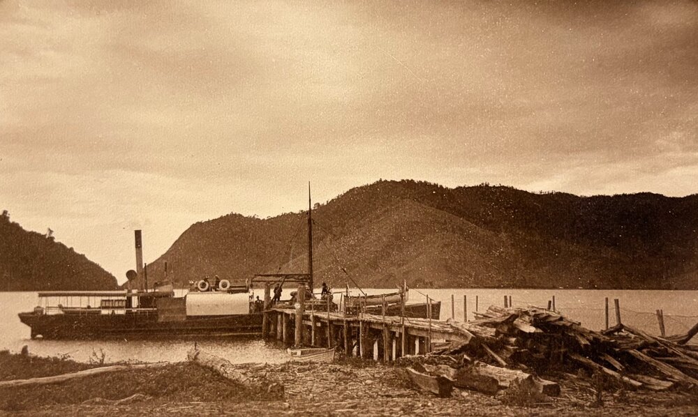 Ship alongside rustic wharf