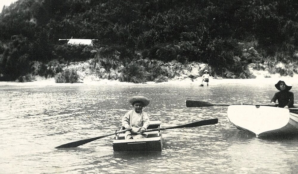 Two children in boats