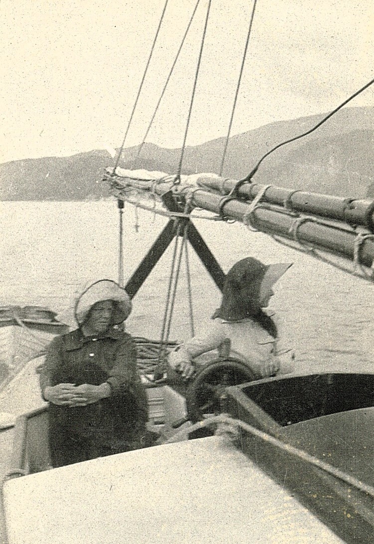Two women sailing a yacht