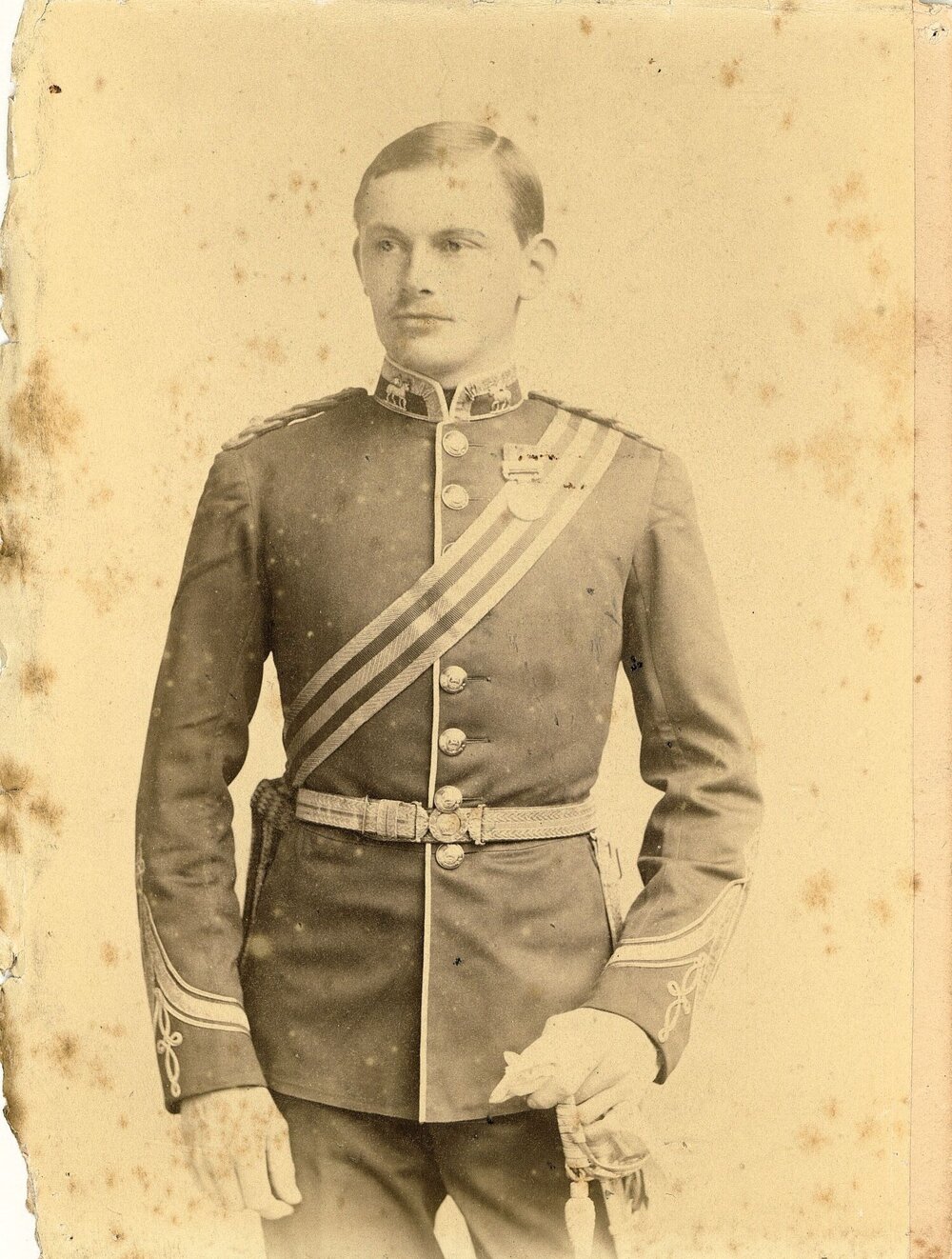 Young man in military uniform