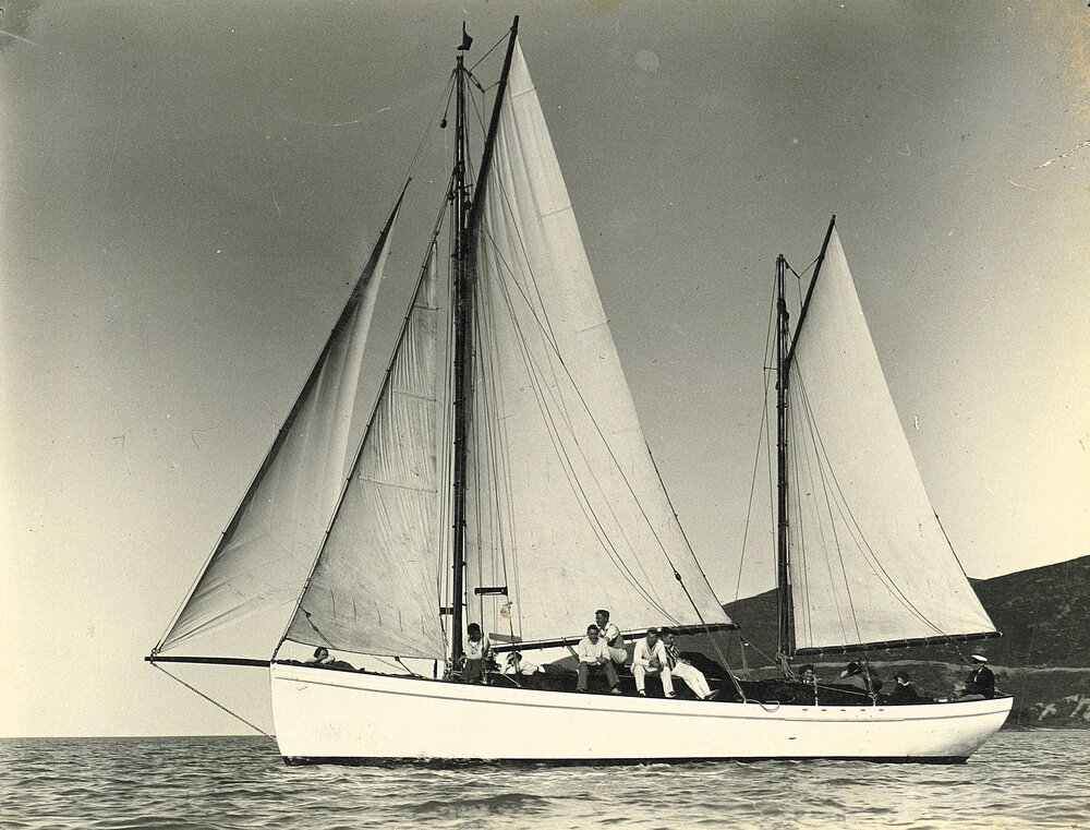 Seven men on a large sailboat