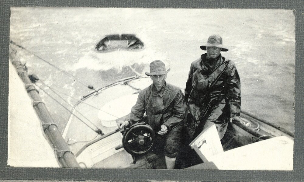 Two men in wet weather gear