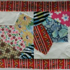 Fabric quilt squares framed within a bigger square