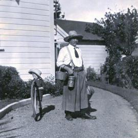 George and child dressed for garden work 