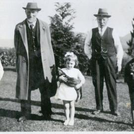 Group with girl holding cat