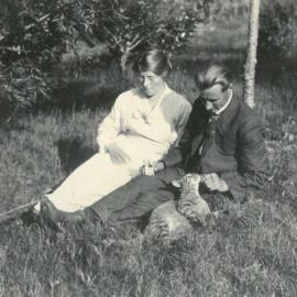 Couple with a tabby cat