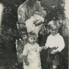 Three children and one adult, 1926