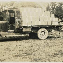 Best Bros. truck being loaded with Victory Apples boxes