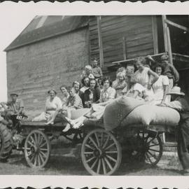 Hop pickers and loaded cart, c1952