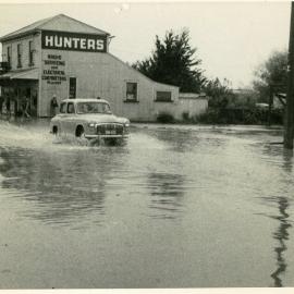 Flood waters surround Hunters Store Queen Street Richmond