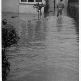 Flooded front yard of a house Queen Street Richmond
