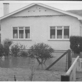 Flooded front yard of house in Richmond