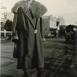 Woman in fur collared coat 