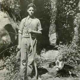 Greg with shovel and dogs 