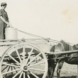 Len Wolfe on horse drawn cart 