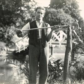 Man with eel at Nelson's Queen's Gardens