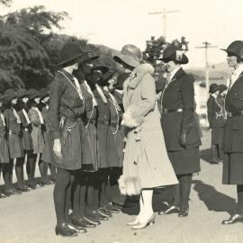 Dorothy Atmore inspecting the Girl Guides parade