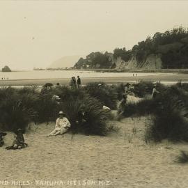 On the sand dunes at Tāhunanui Beach