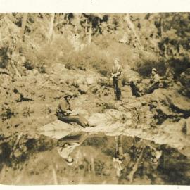 Group reflected in the water