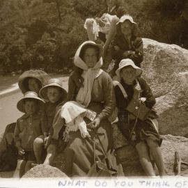 Glasgow family members on rock
