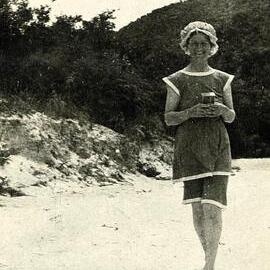 Woman in bathing suit and cap