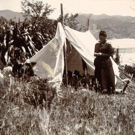 Family and tent at a campsite