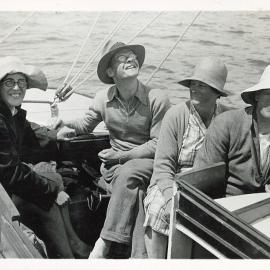 Four people onboard a yacht