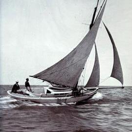 Yacht with wind in its sails