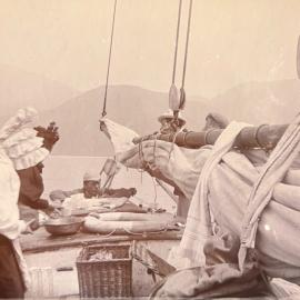 Cleaning up after a tea break onboard a yacht