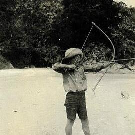 Boy with bow and arrow