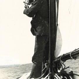 Man using nautic sextant