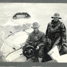 Two men in wet weather gear